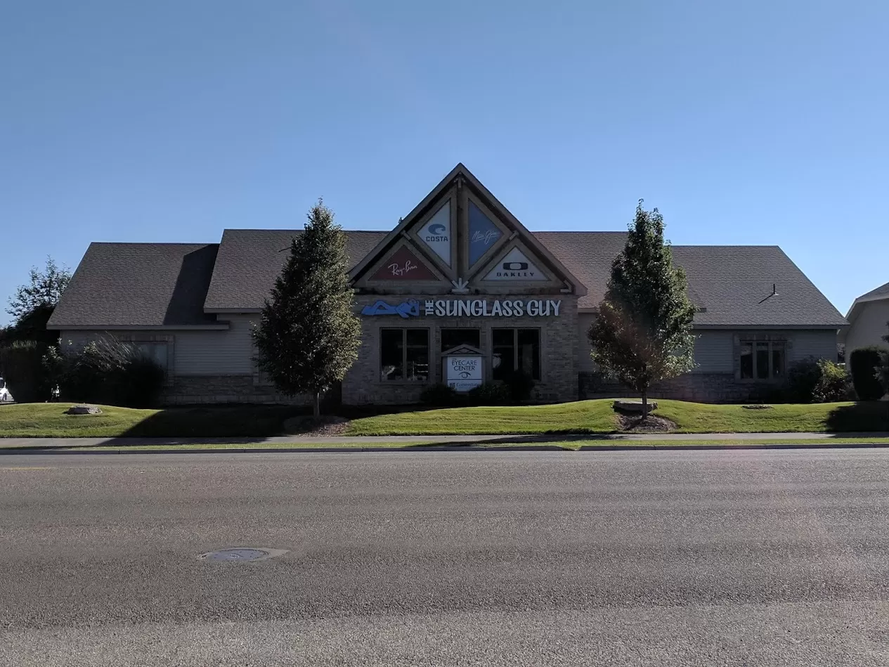 The Eyecare Center Idaho Falls office The Eyecare Center Idaho Falls office on Merlin Drive, a stone and siding building with The Sunglass Guy sign above the entrance.